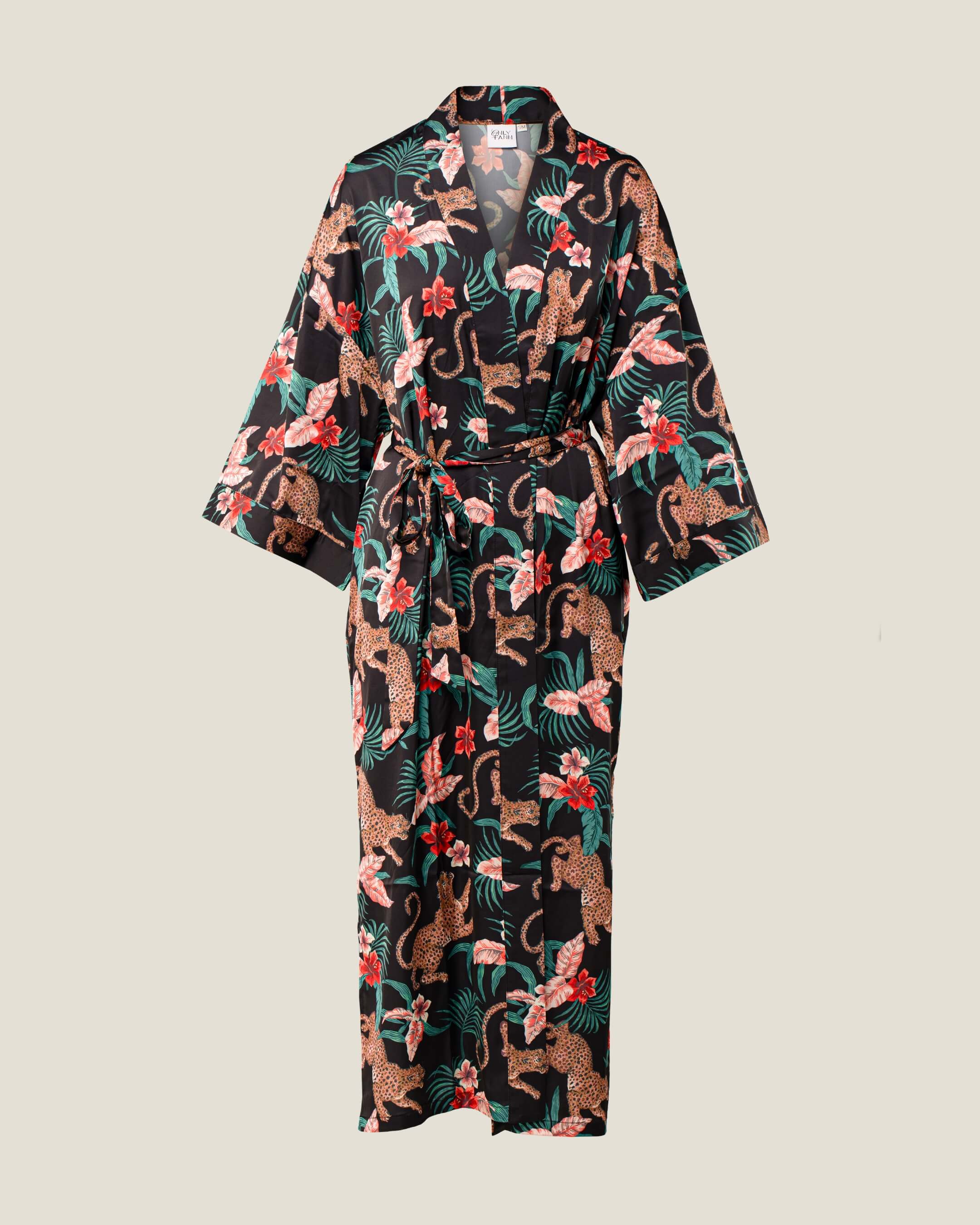 Floral and animal patterned robe on a light beige background
